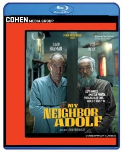 Blu-ray cover for the film "My Neighbor Adolf," featuring two older men standing side by side in front of a house, with festival selections and film details displayed.