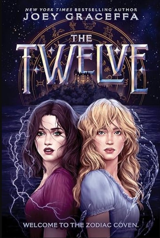 Book cover for "The Twelve" by Joey Graceffa featuring two young women with glowing eyes, lightning, and a mystical background with zodiac symbols and a castle. Text reads: "Welcome to the Zodiac Coven.