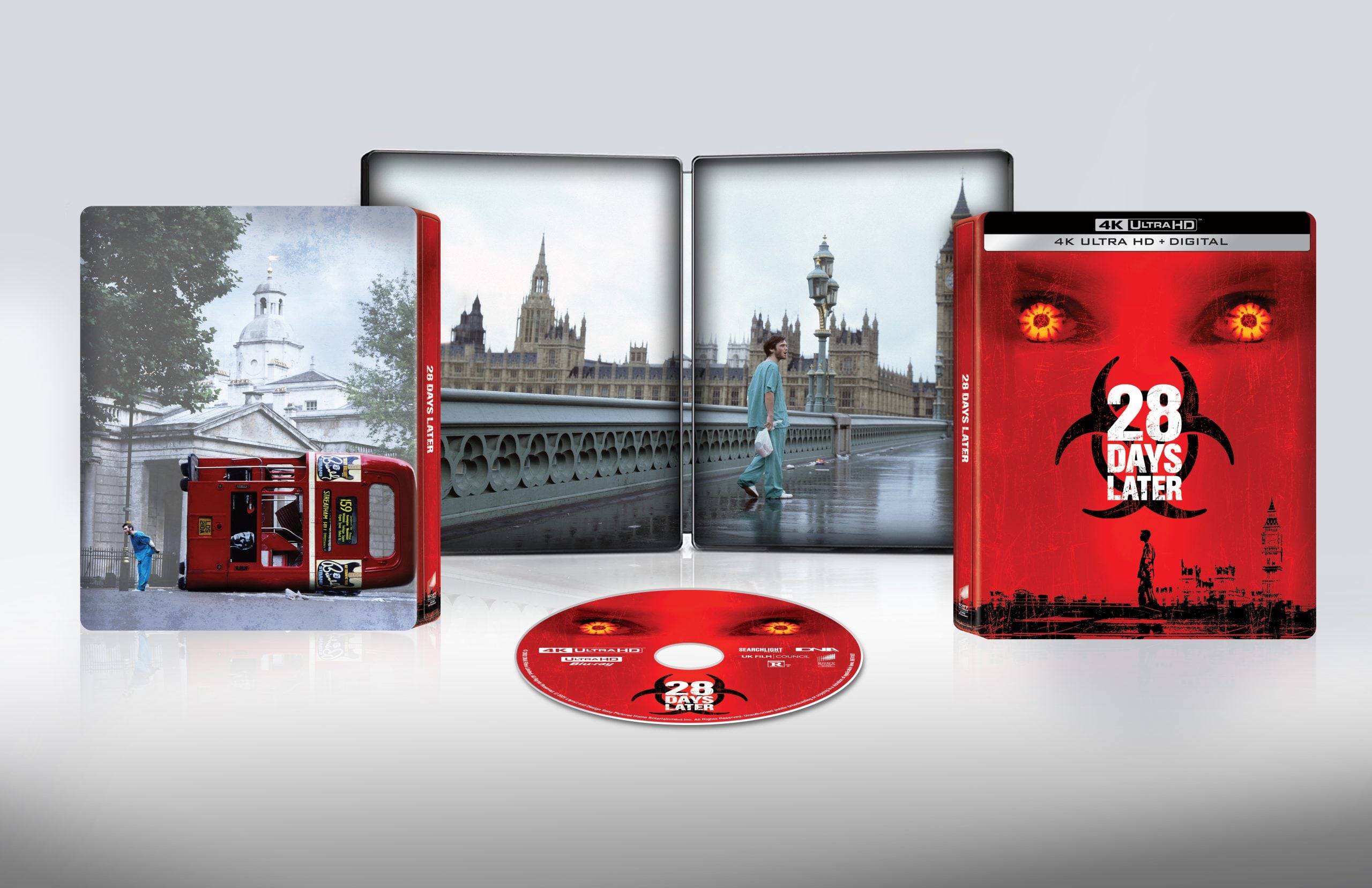 A 4K Ultra HD steelbook edition of "28 Days Later" is displayed with cover art, inner artwork featuring London scenes, and the movie disc in front.