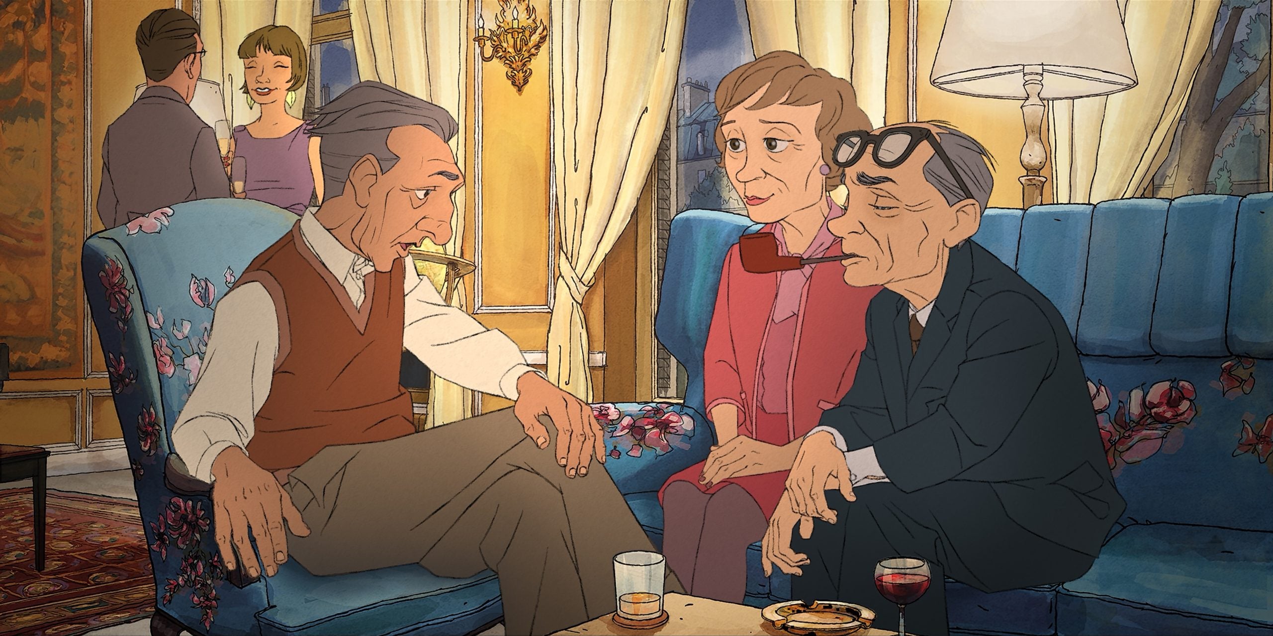Three elderly people sit and talk in a warmly lit living room, drinks on the table, while two others converse in the background near a window.