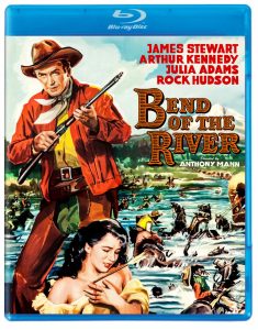 Blu-ray cover of "Bend of the River" featuring a cowboy holding a rifle, a woman in the foreground, and a river scene with people and horses in the background.