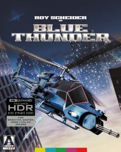 A futuristic, weaponized helicopter flies over a cityscape at night with the title "Blue Thunder" and actor Roy Scheider's name above. A 4K UHD HDR label is featured in the lower left.