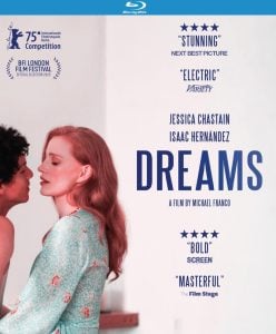 Blu-ray cover for the film "Dreams" featuring Jessica Chastain and Isaac Hernández standing close, with review quotes and film festival accolades displayed.