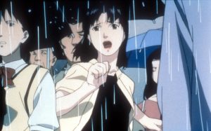 Animated scene of a young woman in a crowd, looking distressed while standing in the rain, with other people and umbrellas visible in the background.