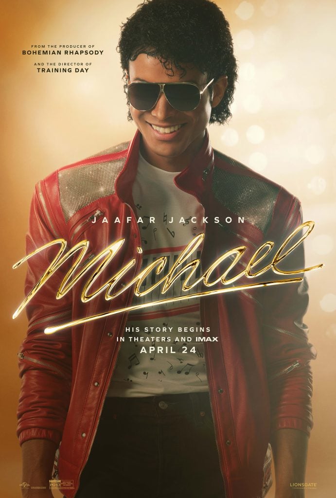 Movie poster for "Michael" featuring a man in a red jacket, sunglasses, and curly hair smiling, with gold text and a release date of April 24.