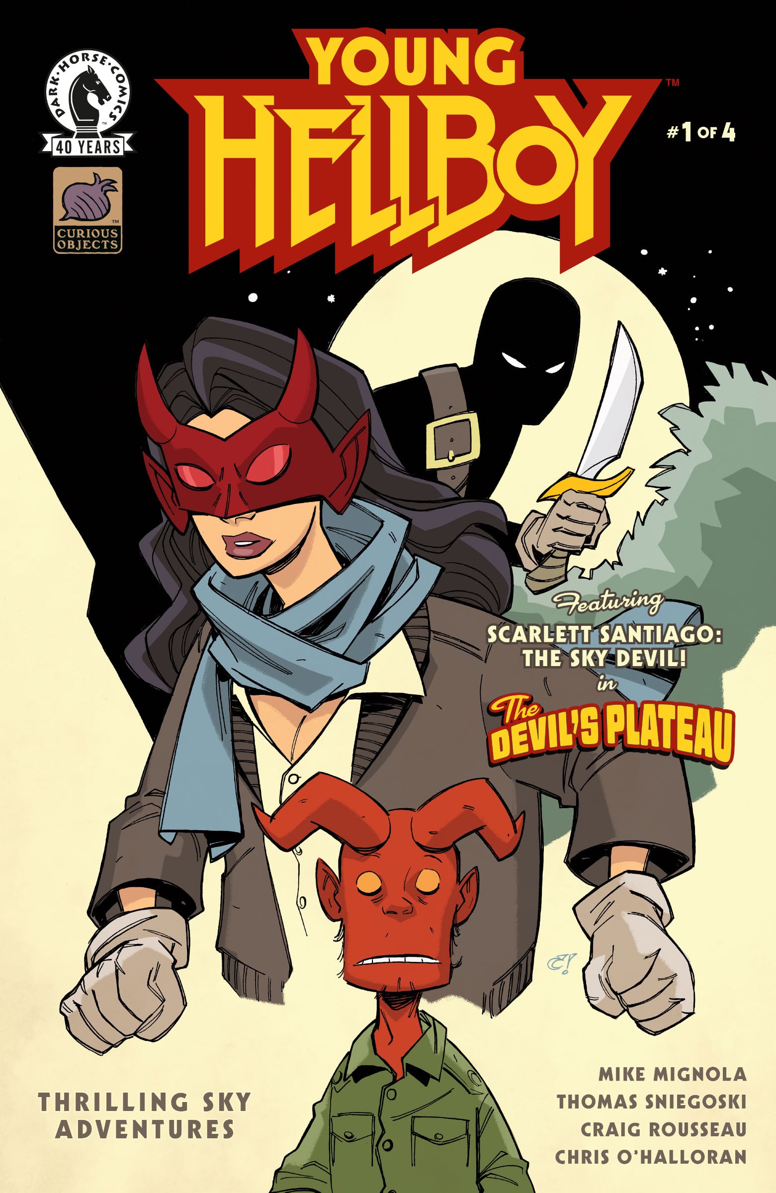 Comic book cover of "Young Hellboy #1" featuring Young Hellboy, a woman in a red mask and aviator goggles, and a shadowy figure in the background, with bold title text.