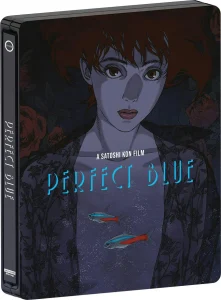 A stylized illustrated cover for "Perfect Blue" featuring a woman with red hair, floral patterns, and two fish, with the title and "A Satoshi Kon Film" text visible.