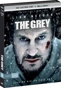 Blu-ray cover for "The Grey" featuring a close-up of Liam Neeson’s face with snow and blood, with the title and tagline "Live or Die on This Day.