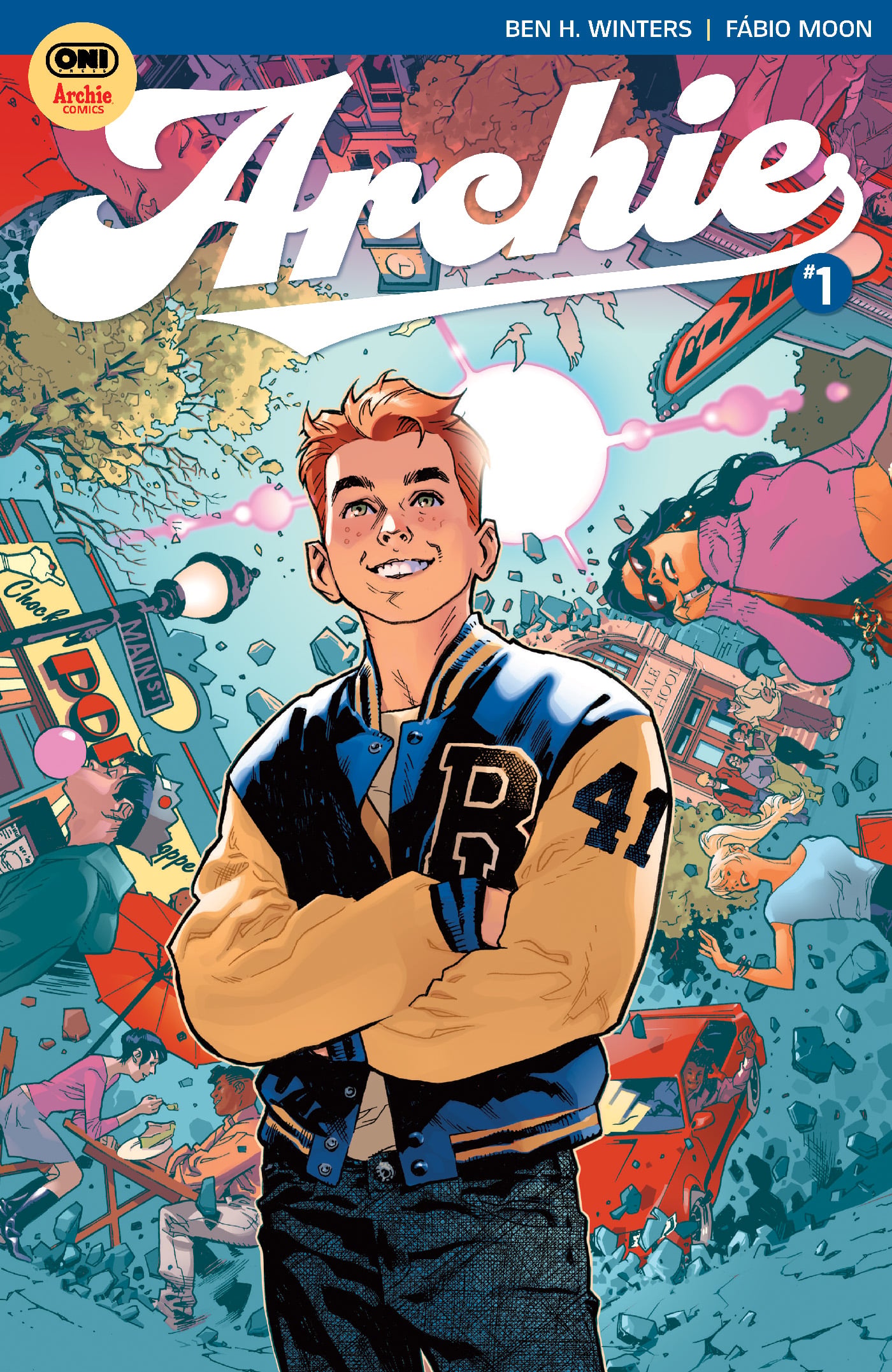 Illustrated comic book cover showing a smiling teenage boy in a letterman jacket with "R" and "41," standing confidently with an energetic town scene and friends in the background.
