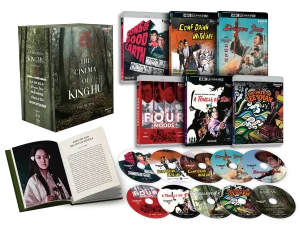 Box set including a book titled "The Cinema of King Hu," several Blu-ray and DVD cases with film art, and multiple illustrated discs arranged around the set.