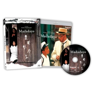 Blu-ray set of "Madadayo" by Akira Kurosawa, showing the case, disc, and cover art featuring characters in traditional Japanese attire and a man in a white hat.