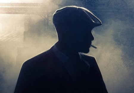 Silhouette of a man in a flat cap smoking a cigarette, with a misty, industrial background and metal bridge structure visible.