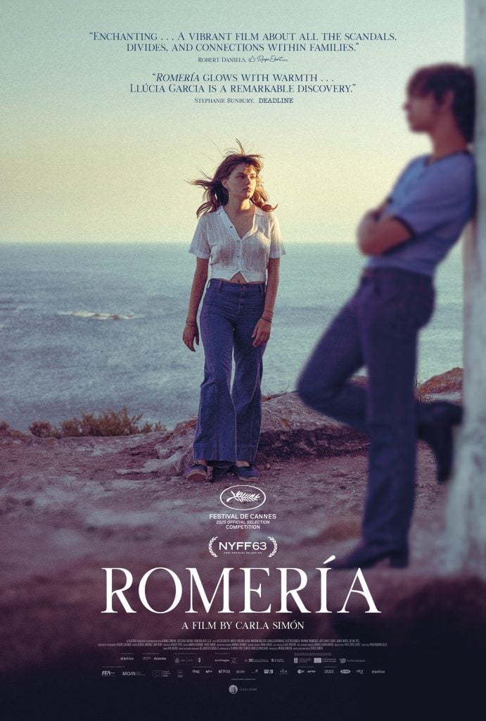 A woman stands on a rocky coastline, looking at a person leaning against a wall. The film poster reads "Romería," directed by Carla Simón, with festival logos and critic quotes above.