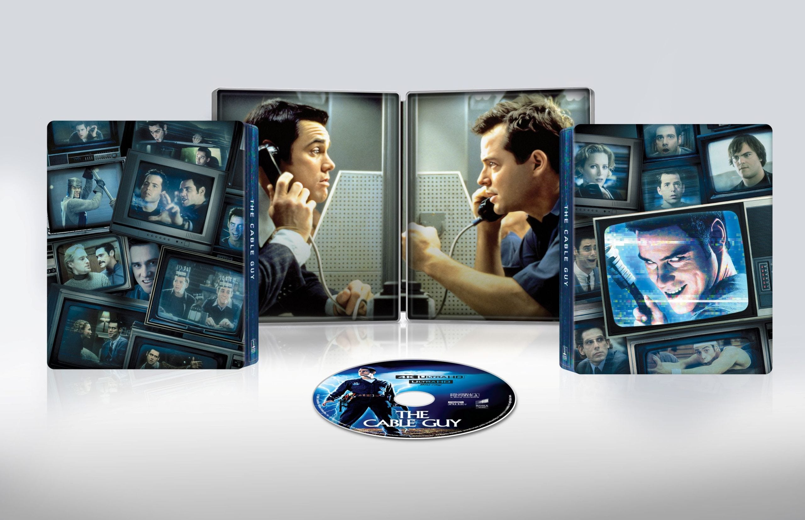 A Blu-ray package of "The Cable Guy" showing the case, inner artwork with two men speaking through glass, and multiple screen images, with the disc placed in front.