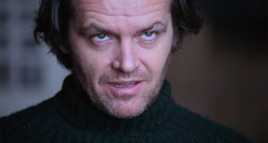 Criterion Collection To Release An Epic 30-Disc Stanley Kubrick Box Set On 4K UHD Blu-Ray This October A man with tousled dark hair and stubble, wearing a dark turtleneck sweater, looks upward with an intense, slightly unsettling expression.