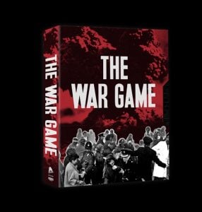 A game box titled "The War Game" featuring a red and black design with a crowd of people and police in the foreground and an explosion in the background.