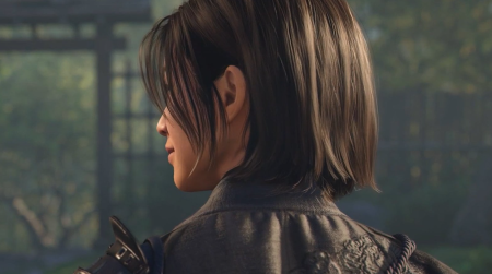 How To Beat Eamon Hathaway In AC Shadows Domains: The Super Templar Boss Guide A person with straight, chin-length dark hair is shown from behind, wearing a dark jacket with an embroidered pattern on the shoulder. The background is blurred greenery and a structure.