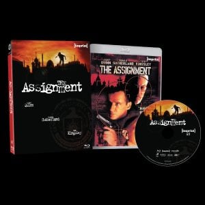 Blu-ray case, cover, and disc for "The Assignment" featuring images of actors and stylized text on a black background.