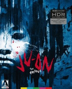 Half-covered eerie face with blue tones and splattered red marks; text reads "JU-ON The Grudge" with 4K Ultra HD HDR label in the upper right corner.