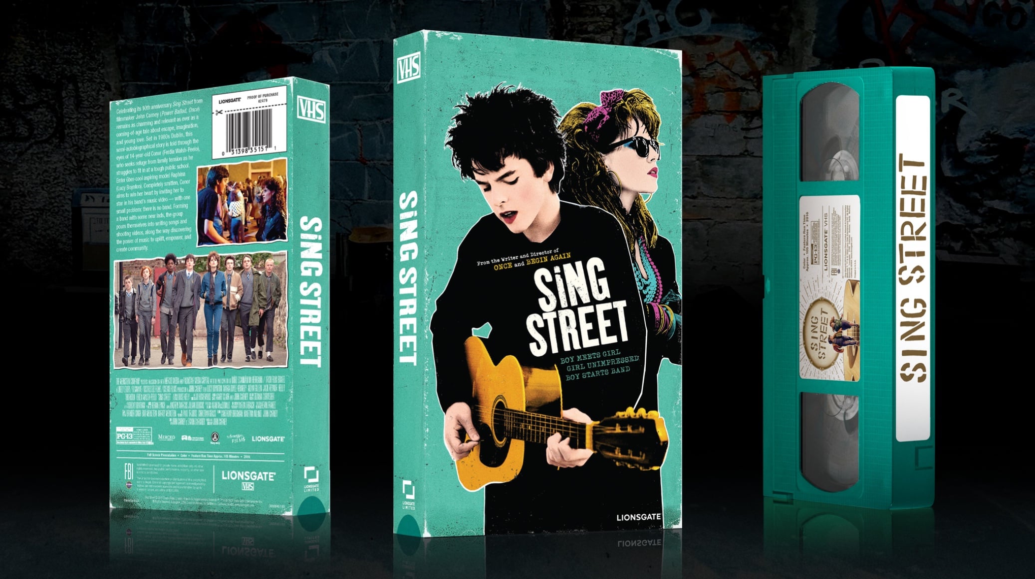 A retro-style VHS tape and case for the film "Sing Street" featuring two teens, one with a guitar, on the front cover against a teal background.