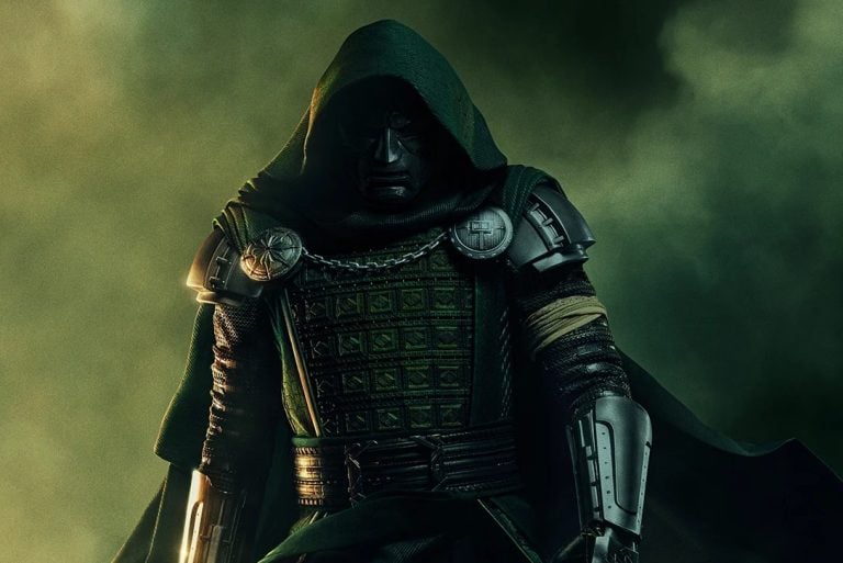 A figure in a green hooded cloak and metallic armor stands against a smoky, dark background, facing forward with a serious expression.