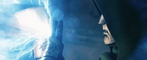 Avengers: Doomsday Death Predictions: Who Lives, Who Dies, And Who Reaches Secret Wars A hooded figure in metallic armor touches a glowing, blue energy cube emitting lightning-like sparks.