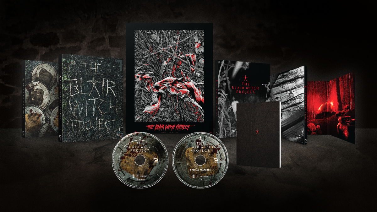 A box set display featuring The Blair Witch Project-themed DVD cases, two discs, a booklet, art prints, and special edition packaging on a dark background.