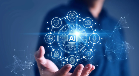 A person holds a digital graphic showing a central AI chip icon surrounded by technology and network symbols on a blue background.