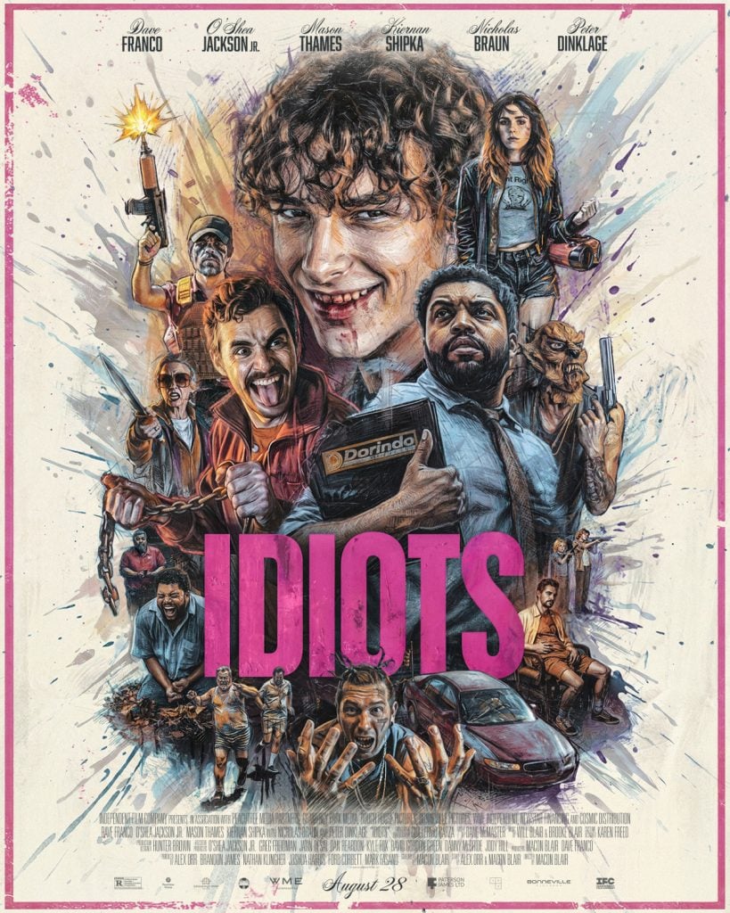 A chaotic movie poster shows several people in wild poses and exaggerated expressions surrounding the large pink title “IDIOTS” in the center, with doodles and action-packed elements filling the background.