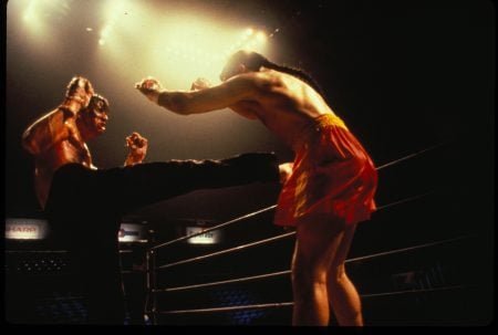 Lionsgate To Release The Dramatic Action Sequel ‘Kickboxer 2’ On Blu-Ray This September Two martial artists spar in a boxing ring under bright arena lights, one delivers a kick to the other’s chest while both wear shorts and are shirtless.