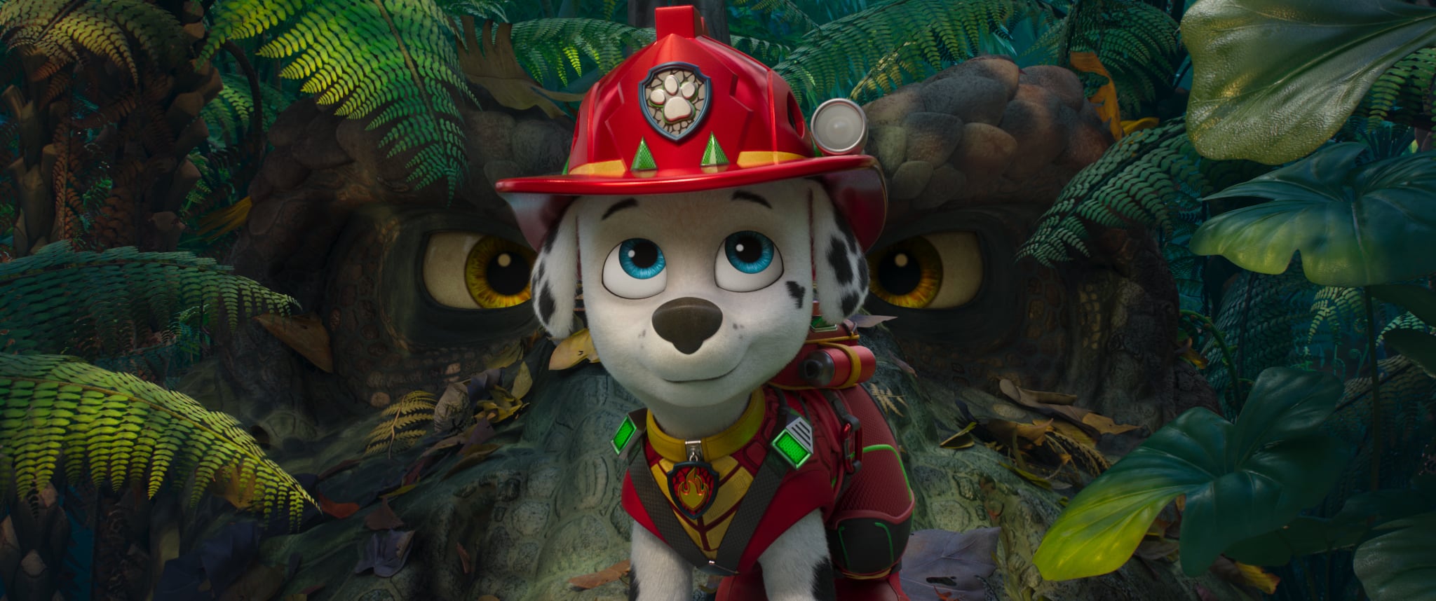 Animated Dalmatian pup in a red firefighter helmet stands in a jungle, with large reptilian eyes watching from the foliage behind.