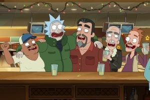 Five animated characters with wide open mouths and arms around each other stand at a bar counter with drinks, under string lights and TV screens in the background.