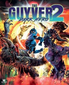 A blue armored figure fights three monstrous creatures amid fiery explosions, with the title “The Guyver 2: Dark Hero” displayed at the top.