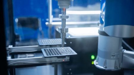 Why AI And Robotics Are Becoming The New Lab Assistants AI robotic lab assistant working in a modern laboratory