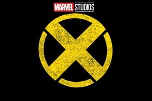 A weathered yellow X inside a circle on a black background, with the Marvel Studios logo above.