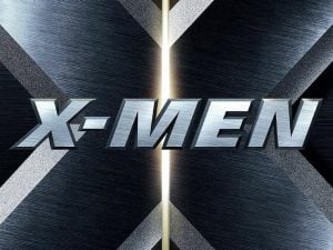 Metallic “X-MEN” text logo displayed in front of a large brushed metal X, with a vertical light beam shining through the center.