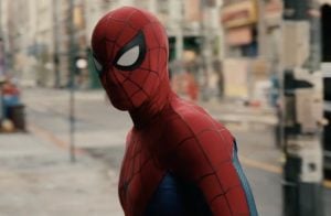 Spider-Man: Brand New Day’s Second Weekend Is Absolutely Insane A person in a red and blue Spider-Man costume stands on a city street, looking toward the camera.