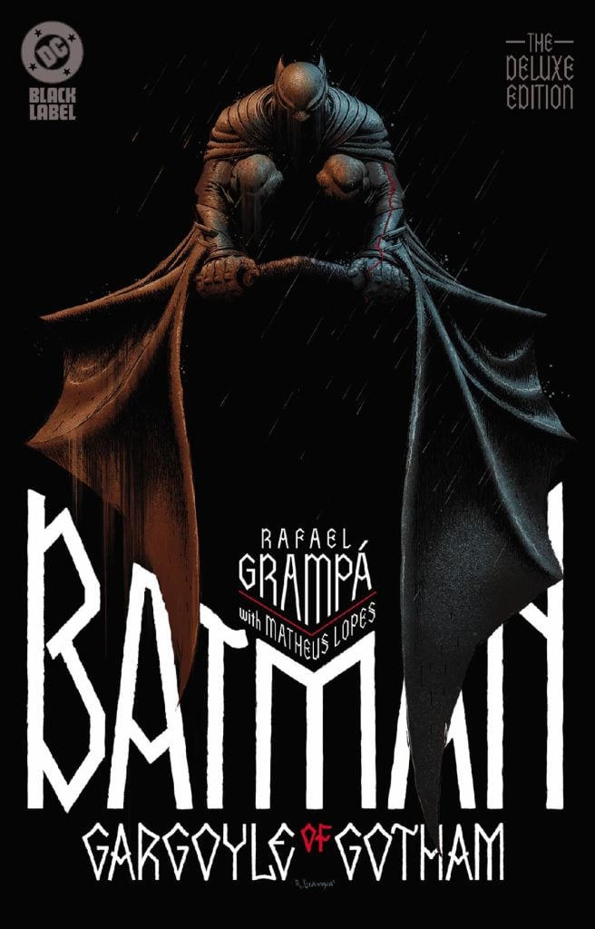 Batman sits hunched on a gargoyle in the rain at night, with one arm and cape in dark brown, the other in black, on the cover of “Batman: Gargoyle of Gotham” deluxe edition.