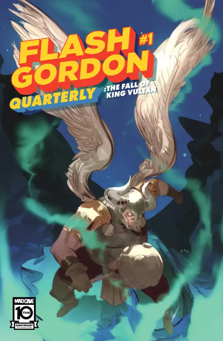 Comic book cover shows a winged warrior with a horned helmet and sword, surrounded by green swirling energy, under the title “Flash Gordon Quarterly #1: The Fall of King Vultan.”.