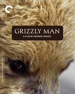 Close-up of a grizzly bear’s face with the text “Grizzly Man, a film by Werner Herzog” on the image. Criterion Collection logo and spine number visible on the left.