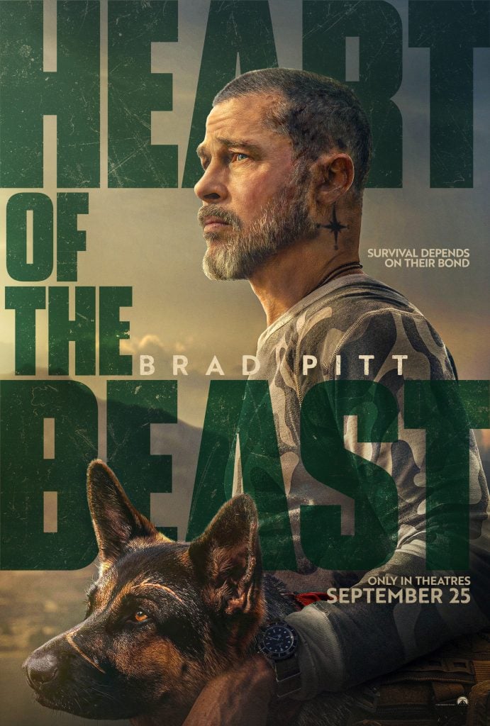 A man with a beard looks into the distance, holding a German Shepherd. Text reads “Heart of the Beast,” with release date “September 25” and the tagline “Survival depends on their bond.”.