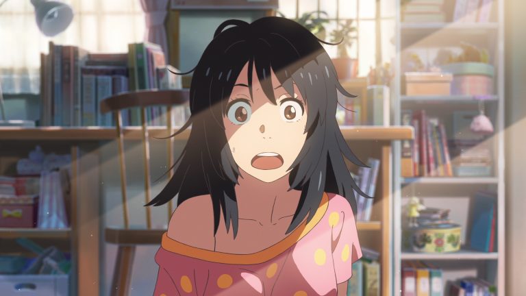 ‘Your Name’ 4K UHD Blu-Ray SteelBook Review – Makoto Shinkai’s Classic Tale Of Sci-Fi Romance Gets An Upgrade Anime girl with messy black hair and wide eyes sits in a sunlit room, wearing a pink shirt with orange spots; bookshelves and various items are visible in the background.