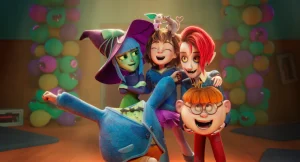 ‘Monster Mia’ Review – A Cute Little Monster Movie With Just Enough Bite A group of animated children and creatures, including a witch and a vampire, posed together for a photo.