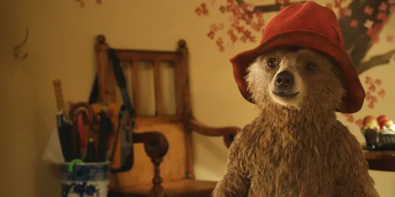 Paddington Bear wearing his signature red hat.