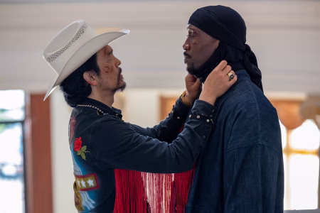 (L to R) John Cho as Pastor Hwan and Mahershala Ali stars as Latif in YOUR MOTHER YOUR MOTHER YOUR MOTHER, from Amazon MGM Studios. Photo Credit: Jaclyn Martinez © 2026 Amazon Content Services LLC. All Rights Reserved.